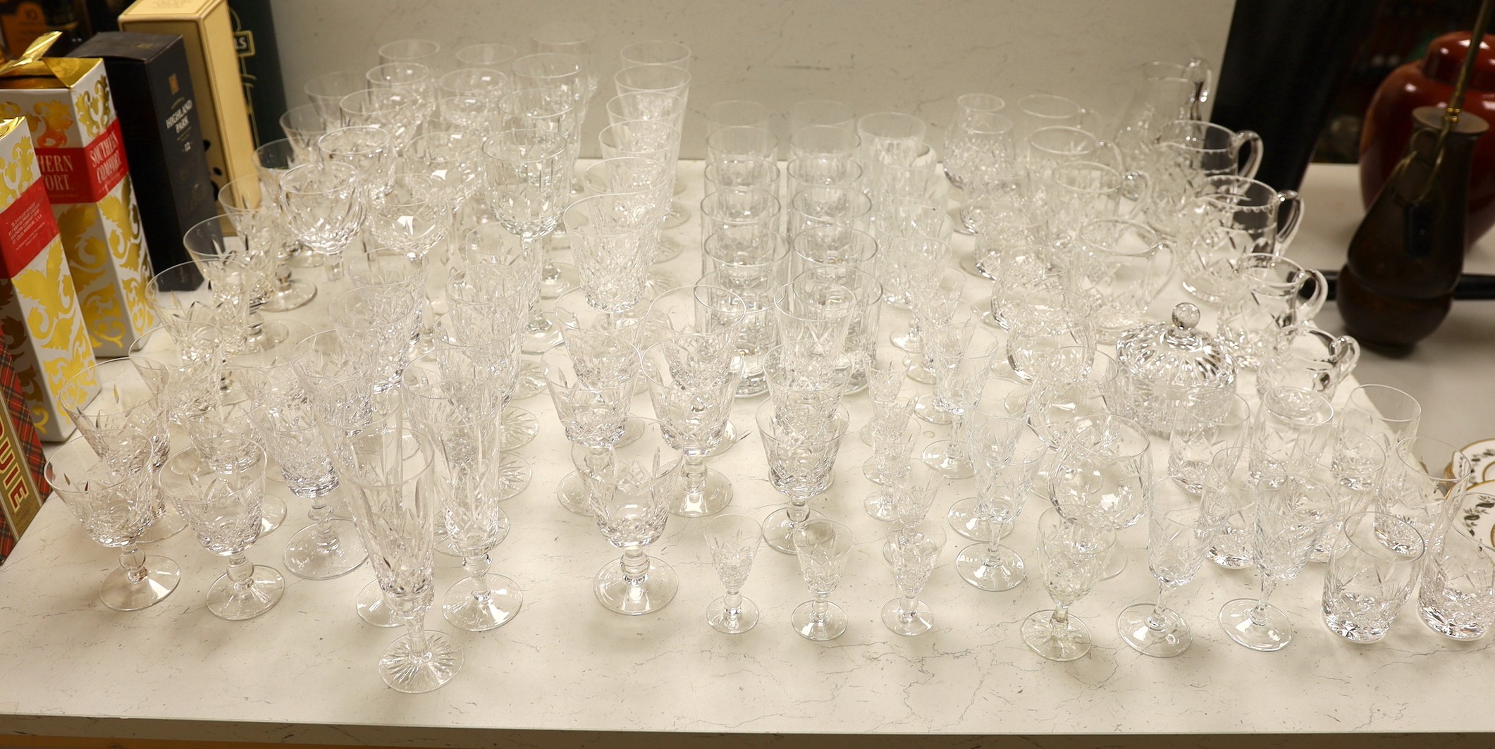 A large collection of suites of mostly Stuart cut glass, including, wine glasses, spirits glasses and jugs